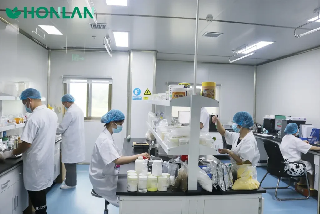 Supplement R&D lab team developing custom formulas for private label dietary supplement manufacturing